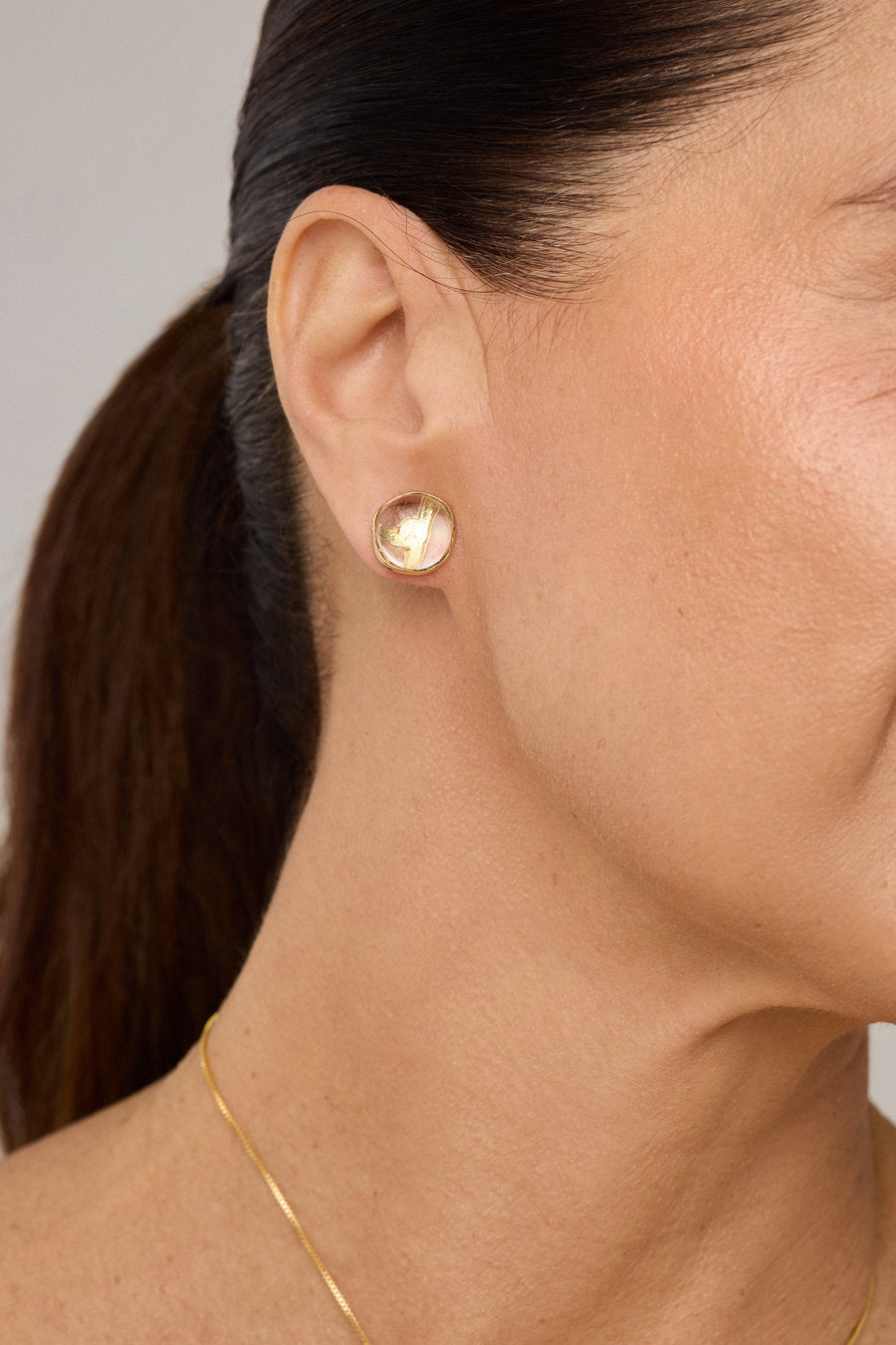 Gold-toned Crystal Duo earrings featuring a contemporary design and sophisticated finish, ideal for gifting and creating elegant looks.