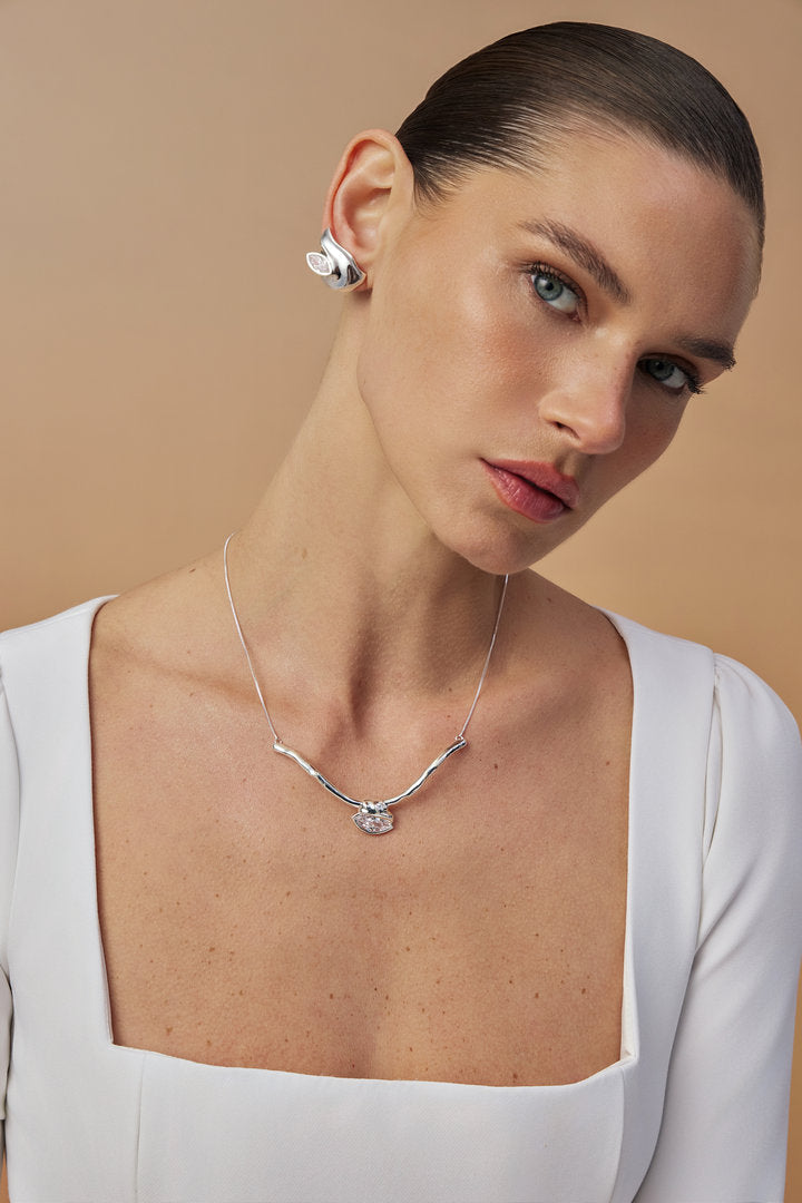 Silver-tone Gabrielle choker featuring fluid metal and Austrian crystal. A luxury accessory for women.