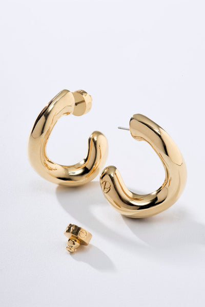 gold hoop, women's hoop, organic-style hoop, sculptural hoop, gold hoop earring, modern hoop, chunky hoop, polished hoop, organic-style earring, statement hoop, sophisticated hoop, gold-plated jewelry, gift hoop, casual-chic earring, designer hoop
